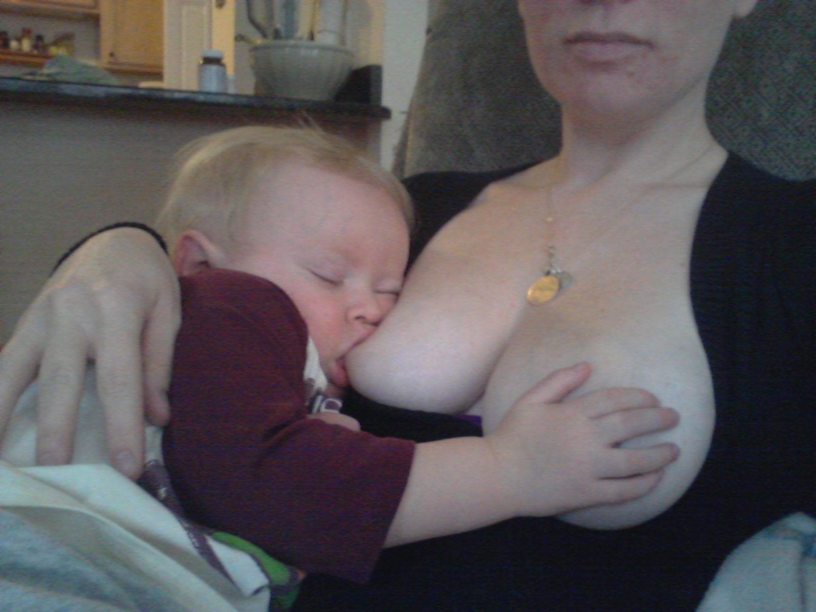 Breastfeeding blonde teen