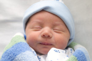 newborn-wrapped-in-blue
